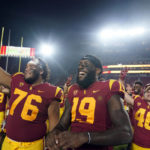 
              Southern California players celebrate after a win over Washington State during an NCAA college football game Saturday, Oct. 8, 2022, in Los Angeles. (AP Photo/Marcio Jose Sanchez)
            