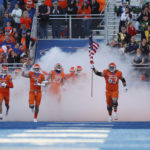 
              Boise State linebacker Brandon Hawkins (3) carries the hammer and offensive linesman Mason Randolph (63) carries the U.S. flag before an NCAA college football game against Colorado State in Boise, Idaho, Saturday, Oct. 29, 2022. (AP Photo/Otto Kitsinger)
            