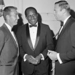 
              FILE - Green Bay Packers' Willie Davis, center, is flanked by Bart Starr, left, and Chicago Bears' Mike Pyle, right, at an awards dinner in Chicago, July 9, 1967. There are 33 players from HBCUs in the Pro Football Hall of Fame, but many of them played during their halcyon days in the 1960s and ‘70s. That's when Eddie Robinson's juggernaut at Grambling State was producing future Packers star Willie Davis, Bears offensive tackle Ernie Ladd and Buck Buchanan, whom the Chiefs picked first overall in the 1963 AFL draft. (AP Photo/Charles Harrity, File)
            