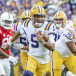 
              LSU quarterback Jayden Daniels scores a touchdown agaanst Mississippi during an NCAA college football game at Tiger Stadium in Baton Rouge, La, Saturday, Oct. 22, 2022. (Scott Clause/The Daily Advertiser via AP)
            