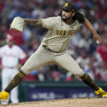 
              San Diego Padres pitcher Sean Manaea throws during the fourth inning in Game 4 of the baseball NL Championship Series between the San Diego Padres and the Philadelphia Phillies on Saturday, Oct. 22, 2022, in Philadelphia. (AP Photo/Matt Rourke)
            