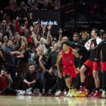 
              The Portland Trail Blazers' bench reacts after guard Anfernee Simons (1) made a basket against the Phoenix Suns during the second half of an NBA basketball game in Portland, Ore., Friday, Oct. 21, 2022. (AP Photo/Craig Mitchelldyer)
            