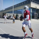 
              Dallas Cowboys quarterback Dak Prescott runs onto the field before participating in an NFL football team practice in Frisco, Texas, Thursday, Oct. 20, 2022.  (AP Photo/LM Otero)
            