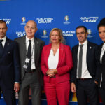 
              From left, Aleksander Ceferin, UEFA President, Bernd Neuendorf, DFB President, Nancy Faeser (SPD), Federal Minister of the Interior, Philipp Lahm, former soccer player and tournament director of the European Championship, during the draw for the groups to qualify for the 2024 European soccer championship in Frankfurt, Germany, Sunday, Oct.9, 2022.  (Arne Dedert/dpa via AP)
            