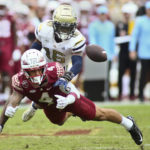 
              Georgia Tech defensive back K.J. Wallace (16) deflects a pass intended for Florida State wide receiver Mycah Pittman (4) in the second quarter of an NCAA college football game Saturday, Oct. 29, 2022, in Tallahassee, Fla. (AP Photo/Phil Sears)
            