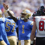 
              UCLA quarterback Dorian Thompson-Robinson (1) signals a first down during the first half of an NCAA college football game against Utah in Pasadena, Calif., Saturday, Oct. 8, 2022. (AP Photo/Ashley Landis)
            