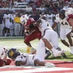 
              Washington State running back Jaylen Jenkins (29) runs for a touchdown while defended by California defensive lineman Jaedon Roberts during the first half of an NCAA college football game, Saturday, Oct. 1, 2022, in Pullman, Wash. (AP Photo/Young Kwak)
            