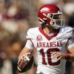 
              Arkansas quarterback Cade Fortin (10) sets up to pass against Mississippi State during the first half of an NCAA college football game in Starkville, Miss., Saturday, Oct. 8, 2022. (AP Photo/Rogelio V. Solis)
            
