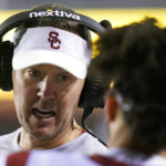 
              Southern California coach Lincoln Riley speaks with quarterback Caleb Williams during the first half of the team's NCAA college football game against Utah on Saturday, Oct. 15, 2022, in Salt Lake City. (AP Photo/Rick Bowmer)
            