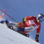 
              Switzerland's Marco Odermatt speeds down the course during an alpine ski, men's World Cup giant slalom, in Soelden, Austria, Sunday, Oct. 23, 2022. (AP Photo/Marco Trovati)
            