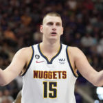 
              Denver Nuggets center Nikola Jokic (15) reacts after looking for a foul during the first half of an NBA basketball game against the Utah Jazz Wednesday, Oct. 19, 2022, in Salt Lake City. (AP Photo/Rick Bowmer)
            