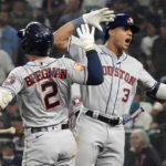 
              Houston Astros' Jeremy Pena (3) celebrates a home run against the Seattle Mariners with Alex Bregman (2) during the 18th inning in Game 3 of an American League Division Series baseball game Saturday, Oct. 15, 2022, in Seattle. (AP Photo/Ted S. Warren)
            