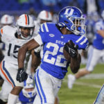 
              Duke's Jaylen Coleman (22) carries the ball during the first half of an NCAA college football game against Virginia in Durham, N.C., Saturday, Oct. 1, 2022. (AP Photo/Ben McKeown)
            