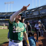 
              Oakland Athletics' Stephen Vogt exits the field after the team's 3-2 victory over the Los Angeles Angels in a baseball game in Oakland, Calif., Wednesday, Oct. 5, 2022. (AP Photo/Godofredo A. Vásquez)
            