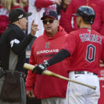 
              Cleveland Guardians manager Terry Francona, center, argues with home plate umpire Adam Hamari (78) after Andres Gimenez (0) was called out on strikes in the 12th inning of a wild card baseball playoff game against the Tampa Bay Rays, Saturday, Oct. 8, 2022, in Cleveland. (AP Photo/Phil Long)
            