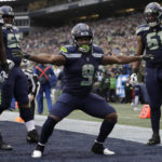 
              Seattle Seahawks running back Kenneth Walker III (9) celebrates after scoring a touchdown against the New York Giants during the second half of an NFL football game in Seattle, Sunday, Oct. 30, 2022. (AP Photo/John Froschauer)
            