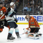 
              Anaheim Ducks goaltender John Gibson (36) blocks a shot in front of Seattle Kraken right wing Jordan Eberle (7) during the first period of an NHL hockey game in Anaheim, Calif., Wednesday, Oct. 12, 2022. (AP Photo/Kyusung Gong)
            