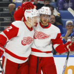 
              Detroit Red Wings defenseman Olli Maatta (2) celebrates after his goal with center Andrew Copp (18) during the second period of an NHL hockey game against the Buffalo Sabres, Monday, Oct. 31, 2022, in Buffalo, N.Y. (AP Photo/Jeffrey T. Barnes)
            