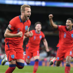 
              England's Harry Kane celebrates after scoring during the UEFA Nations League soccer match between England and Germany at the Wembley Stadium in London, England, Monday, Sept. 26, 2022. (AP Photo/Alastair Grant)
            