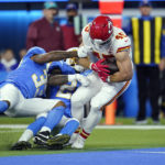 
              Kansas City Chiefs fullback Michael Burton scores a touchdown during the first half of an NFL football game against the Los Angeles Chargers on Dec. 16, 2021, in Inglewood, Calif. In the past two decades the fullback become nearly extinct, as teams grapple with roster limits and salary cap restraints that force general managers to value players that can do a little bit of everything. (AP Photo/Ashley Landis, File)
            