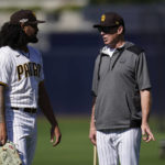 
              San Diego Padres pitcher Sean Manaea, left, talks with manager Bob Melvin during practice ahead of Game 1 of the baseball NL Championship Series against the Philadelphia Phillies, Monday, Oct. 17, 2022, in San Diego. The Padres host the Phillies for Game 1 Oct. 18. (AP Photo/Gregory Bull)
            