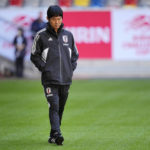 
              FILE - Head coach Hajime Moriyasu walks on the pitch during a training session of Japan's national soccer team in Duesseldorf, Germany, prior a friendly match against the USA, Thursday, Sept. 22, 2022. (AP Photo/Martin Meissner, File)
            