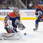 
              Edmonton Oilers goalie Jack Campbell (36) makes a save against the St. Louis Blues during the third period of an NHL game in Edmonton, Alberta, Saturday, Oct. 22, 2022. (Jason Franson/The Canadian Press via AP)
            