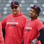 
              Cleveland Guardians manager Terry Francona, left, talks with Jose Ramirez, right, during a workout, Thursday, Oct. 6, 2022, in Cleveland, the day before their wild card baseball playoff game against the Tampa Bay Rays. (AP Photo/David Dermer)
            