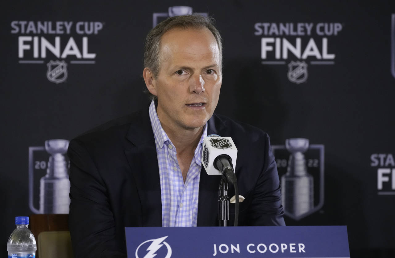 FILE - Tampa Bay Lightning head coach Jon Cooper speaks during an NHL hockey media day before Game ...
