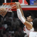 
              Chicago Bulls' Nikola Vucevic dunks during the first half of an NBA basketball game against the Cleveland Cavaliers, Saturday, Oct. 22, 2022, in Chicago. (AP Photo/Paul Beaty)
            