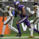 
              Minnesota Vikings wide receiver Justin Jefferson (18) is stopped just short of the end zone during an NFL match between Minnesota Vikings and New Orleans Saints at the Tottenham Hotspur stadium in London, Sunday, Oct. 2, 2022. (AP Photo/Frank Augstein)
            