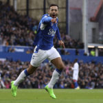 
              Everton's Dwight McNeil celebrates scoring during the English Premier League soccer match between Everton and Crystal Palace at Goodison Park, Liverpool, England, Saturday Oct. 22, 2022. (Isaac Parkin/PA via AP)
            