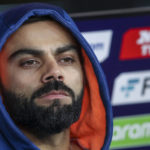 
              India's Virat Kohli watches play from the players dugout during the T20 World Cup cricket match between the India and South Africa in Perth, Australia, Sunday, Oct. 30, 2022. (AP Photo/Gary Day)
            