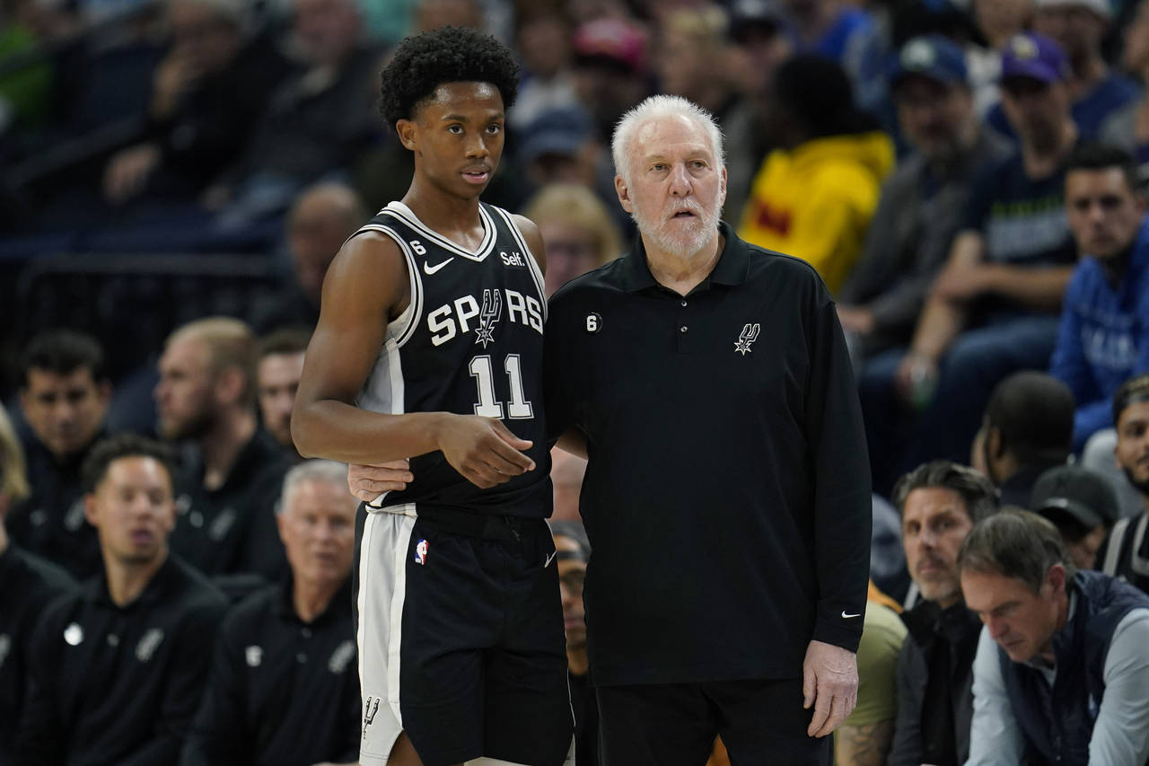 San Antonio Spurs guard Joshua Primo (11) and head coach Gregg Popovich watch play during the first...