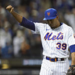
              New York Mets relief pitcher Edwin Diaz (39) reacts as he walks off the field during the eighth inning of Game 2 of a National League wild-card baseball playoff series against the San Diego Padres, Saturday, Oct. 8, 2022, in New York. (AP Photo/John Minchillo)
            