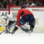 
              Los Angeles Kings goaltender Jonathan Quick (32) tracks the puck against Washington Capitals left wing Alex Ovechkin (8) during the first period of an NHL hockey game, Saturday, Oct. 22, 2022, in Washington. (AP Photo/Nick Wass)
            