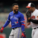 
              Baltimore Orioles designated hitter Jesus Aguilar, right, and Toronto Blue Jays' Teoscar Hernandez talk after Aguilar putout Hernandez on a groundout to first base during the fifth inning of the second game of a baseball doubleheader, Wednesday, Oct. 5, 2022, in Baltimore. AP Photo/Julio Cortez)
            
