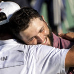 
              Jon Rahm, of Spain, celebrates after winning the Spanish Open golf tournament at Club de Campo Villa in Madrid, Spain, Sunday, Oct. 9, 2022. (AP Photo/Manu Fernandez)
            