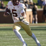 
              Boston College quarterback Phil Jurkovec (5) runs against Wake Forest during the first half of an NCAA college football game in Winston-Salem, N.C., Saturday, Oct. 22, 2022. (AP Photo/Chuck Burton)
            