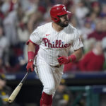 
              Philadelphia Phillies' Kyle Schwarber watches his home run during the first inning in Game 3 of the baseball NL Championship Series between the San Diego Padres and the Philadelphia Phillies on Friday, Oct. 21, 2022, in Philadelphia.(AP Photo/Matt Slocum)
            