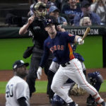 
              Houston Astros Alex Bregman (2) hits a solo homer during the third inning in Game 2 of baseball's American League Championship Series between the Houston Astros and the New York Yankees, Thursday, Oct. 20, 2022, in Houston. (AP Photo/Sue Ogrocki )
            