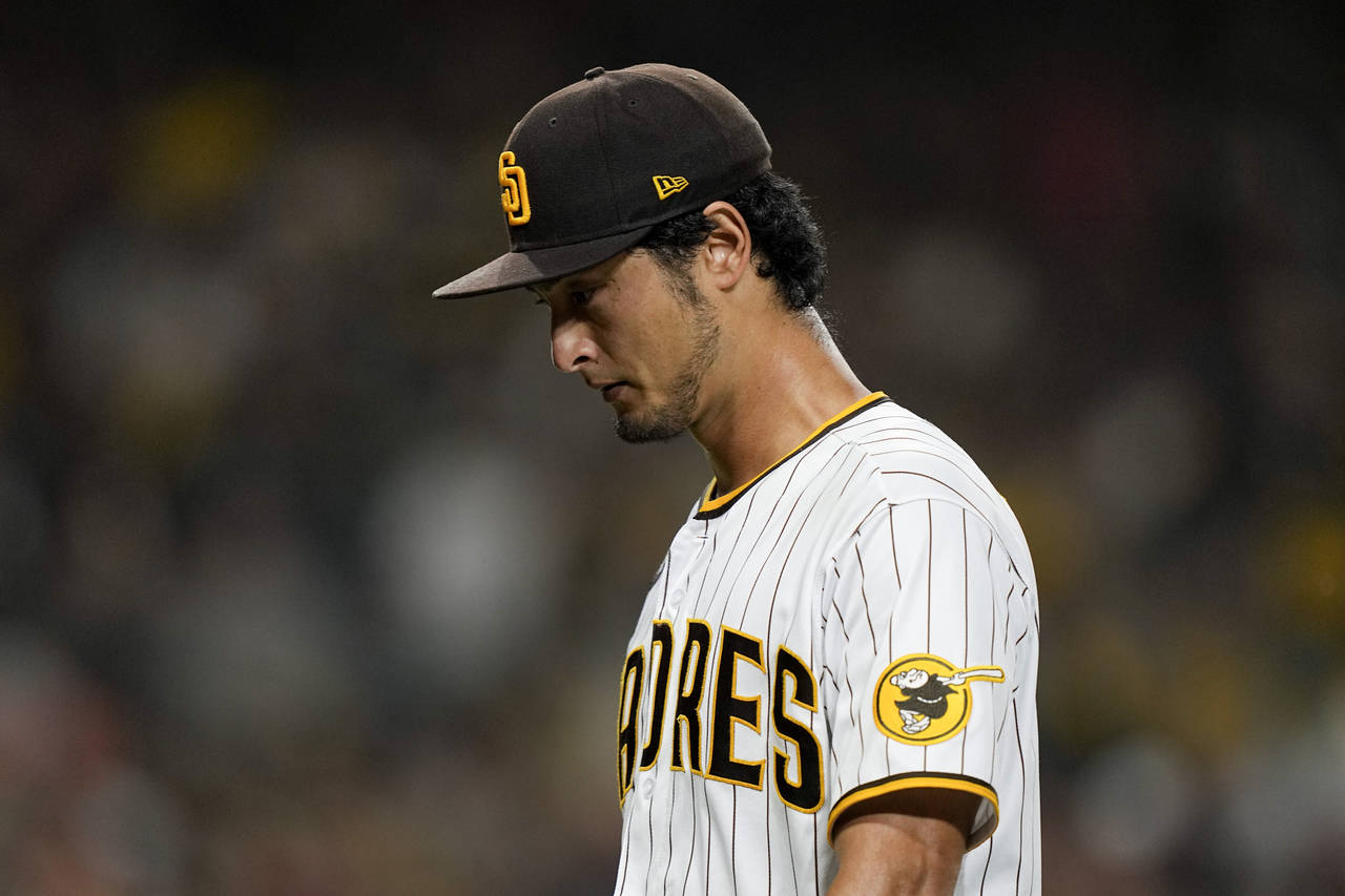 San Diego Padres starting pitcher Yu Darvish leaves the field during the seventh inning in Game 1 o...