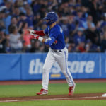 
              Toronto Blue Jays centre fielder Whit Merrifield rounds the bases after hitting a solo home run in the third inning of a baseball game against the Boston Red Sox in Toronto, Sunday, Oct. 2, 2022. (Cole Burston/The Canadian Press via AP)
            
