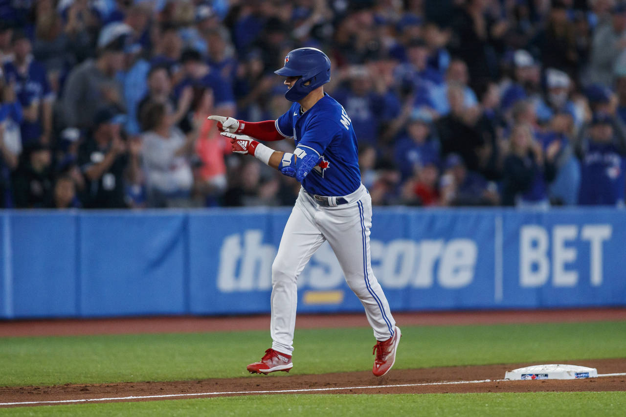 Toronto Blue Jays centre fielder Whit Merrifield rounds the bases after hitting a solo home run in ...