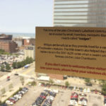 
              FILE - A sign in a hotel room between Lake Erie and Progressive Field, site of the baseball 2019 baseball All-Star game, informs guests about flying insects called "midges," that swarm the area this time of the year, Tuesday, July 9, 2019, in Cleveland. Their fans still bugged by what happened in 2007, the New York Yankees could face pesky midges again when the American League Division Series moves to Cleveland this weekend. (AP Photo/Ben Walker, File)
            