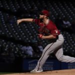 
              Arizona Diamondbacks starting pitcher Merrill Kelly throws during the first inning of a baseball game against the Milwaukee Brewers Wednesday, Oct. 5, 2022, in Milwaukee. (AP Photo/Morry Gash)
            