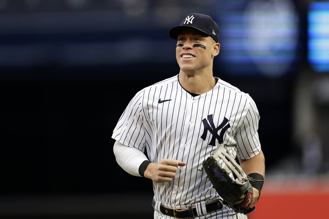 New York Yankees right fielder Aaron Judge runs to the dugout during the sixth inning of the team's...