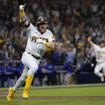 
              San Diego Padres' Jake Cronenworth reacts after hitting a two-run single during the seventh inning in Game 4 of a baseball NL Division Series against the Los Angeles Dodgers, Saturday, Oct. 15, 2022, in San Diego. (AP Photo/Ashley Landis)
            