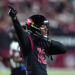 
              Arizona Cardinals wide receiver DeAndre Hopkins (10) celebrates during the first half of an NFL football game against the New Orleans Saints, Thursday, Oct. 20, 2022, in Glendale, Ariz. (AP Photo/Ross D. Franklin)
            