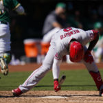 
              Los Angeles Angels' Luis Rengifo reacts after striking out swinging against the Oakland Athletics during the fifth inning of a baseball game in Oakland, Calif., Wednesday, Oct. 5, 2022. (AP Photo/Godofredo A. Vásquez)
            